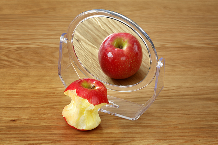 apple looking in mirror