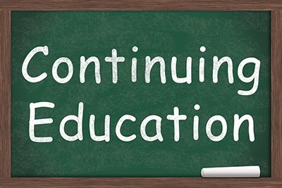 chalkboard with writing-continuing education